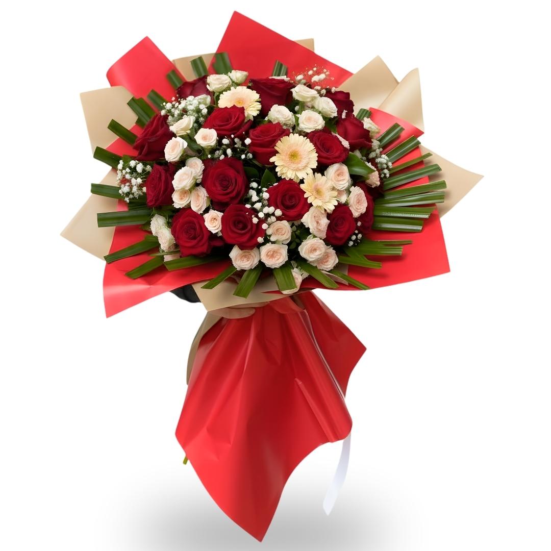 Bouquet of red and white flowers wrapped in red paper on a white background