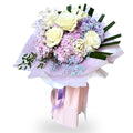 Bouquet of flowers with white and purple flowers on a white background