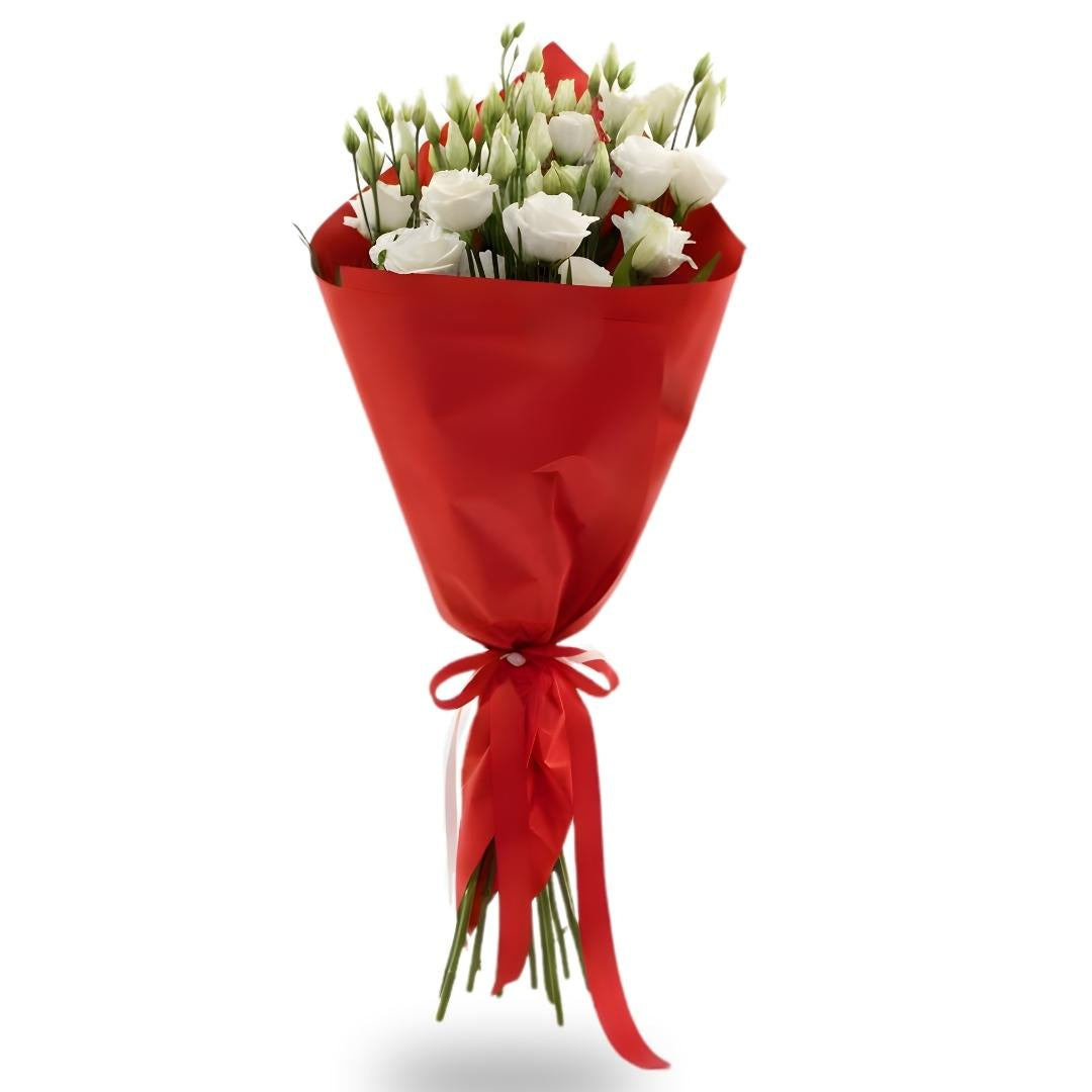 Bouquet of white roses wrapped in red paper with a red ribbon on a white background