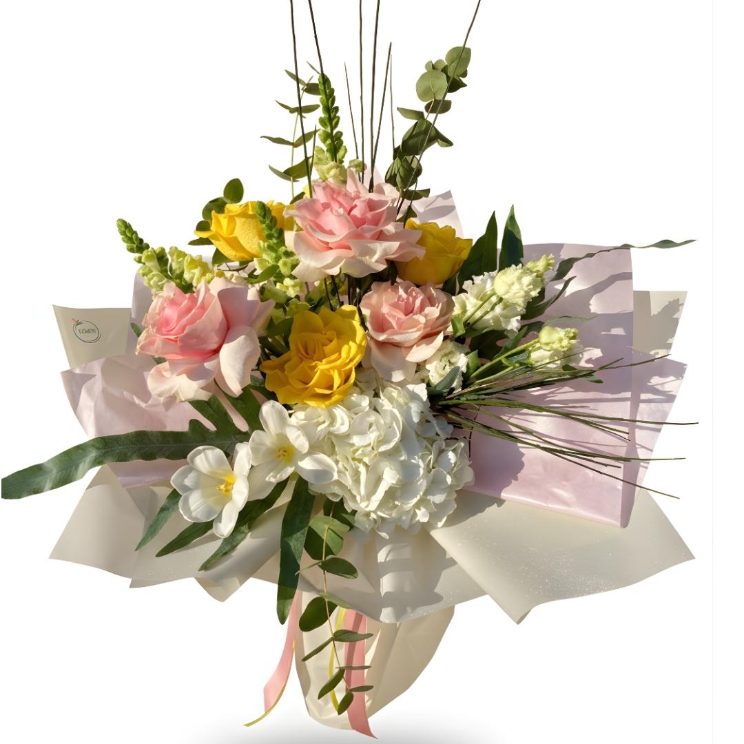 Bouquet of flowers with pink, yellow, and white flowers on a white background