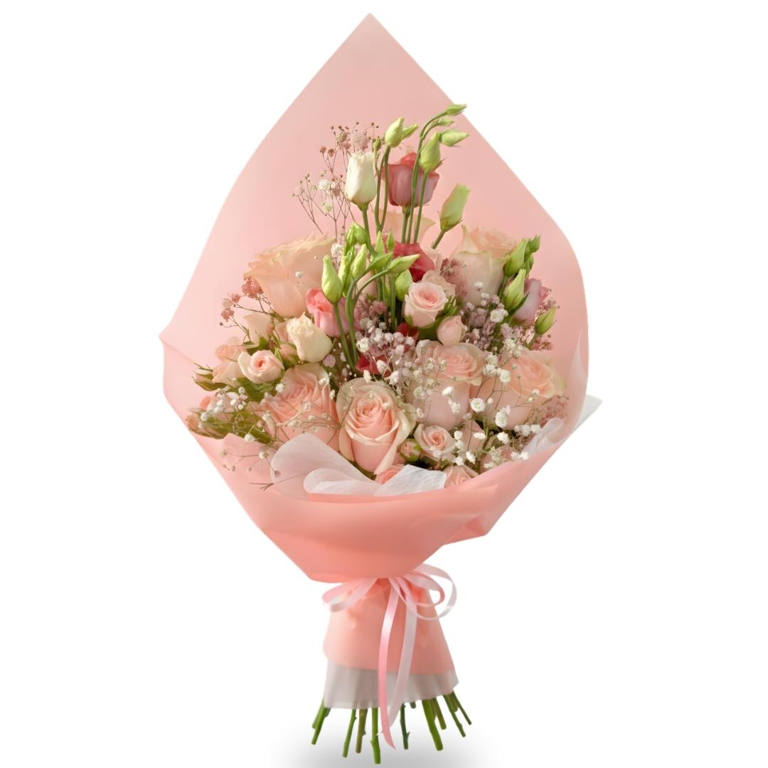 Bouquet of flowers wrapped in pink paper on a white background