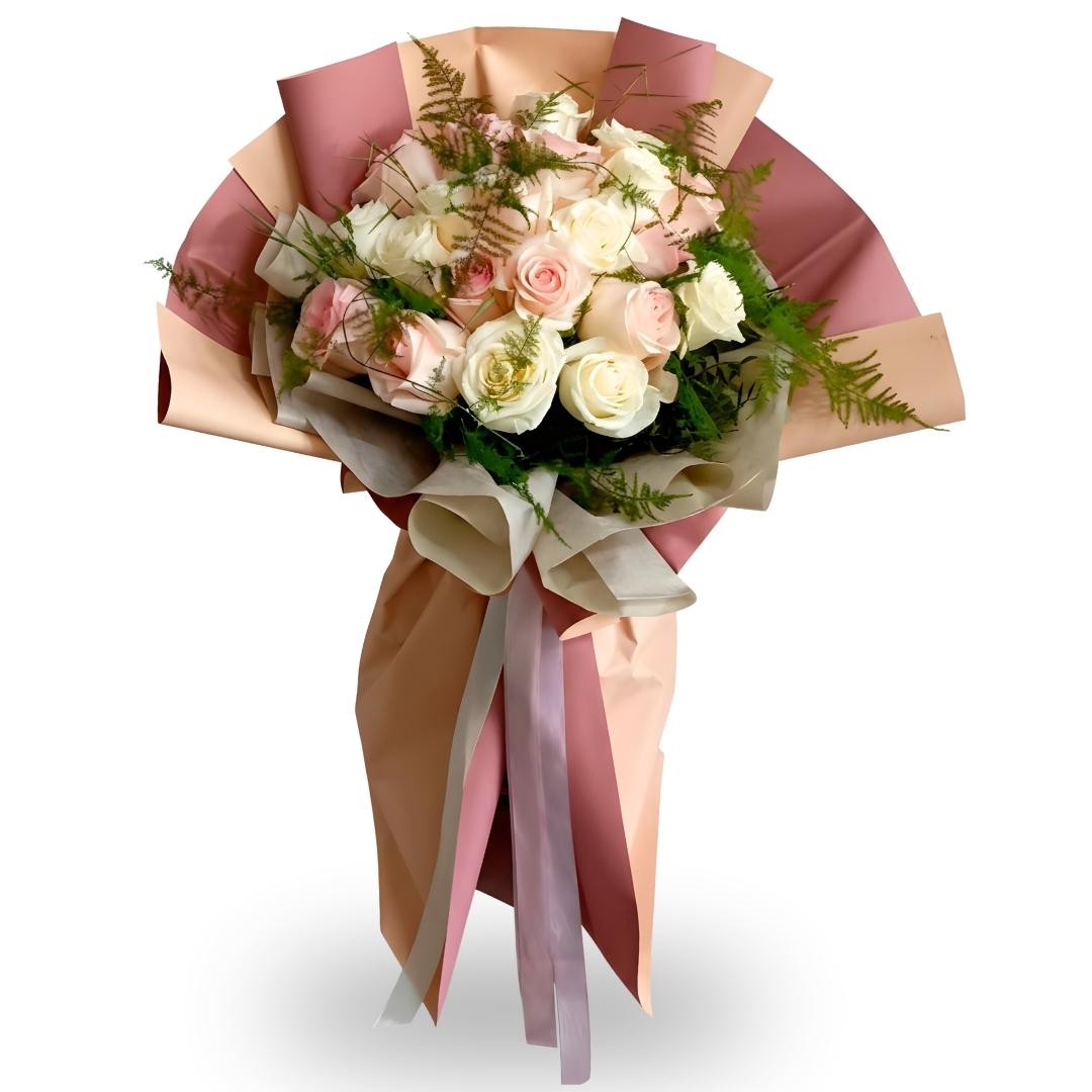 Bouquet of flowers wrapped in pink and brown paper with ribbons on a white background