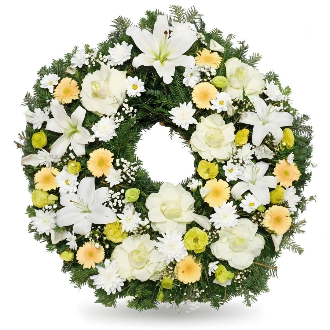 Floral wreath with white, yellow, and green flowers on a white background