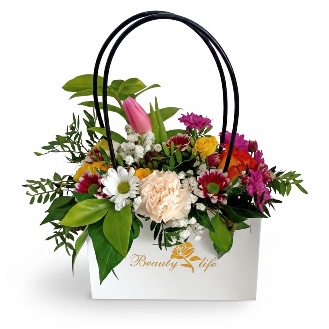 Floral arrangement in a white bag with 'Beauty Life' branding on a white background